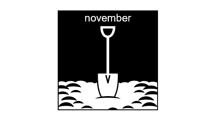 Illustrationen visar en spade som sitter fast i marken. Ovanför spaden ser vi texten "november".