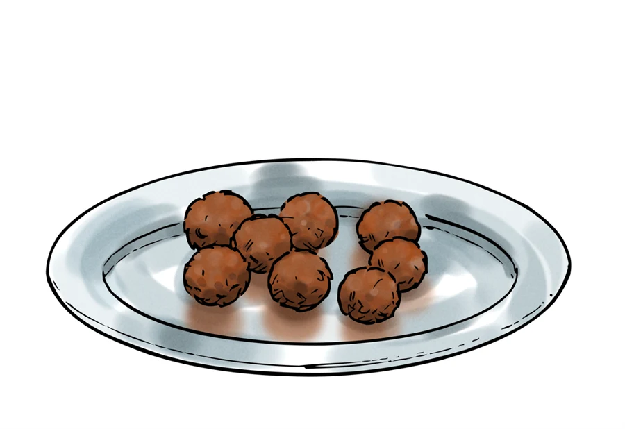 En tallrik med köttbullar.