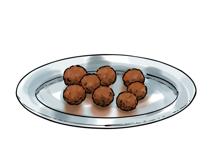 En tallrik med köttbullar.